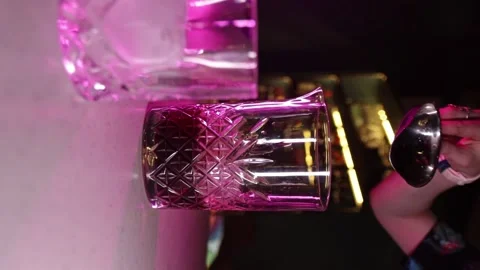 Vertical Video - Adding Ice to Cocktail Stock Footage 247136594