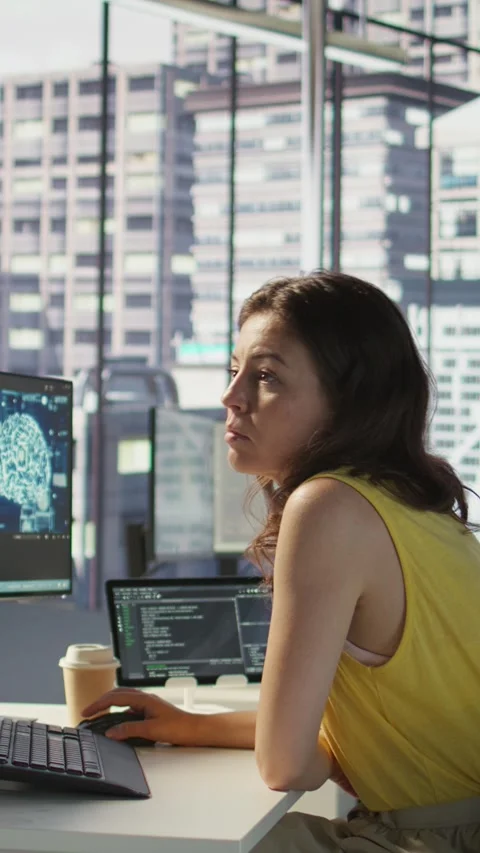 Vertical video Admin and coworker conducting experiments and tests to optimize Stock Footage 319491689