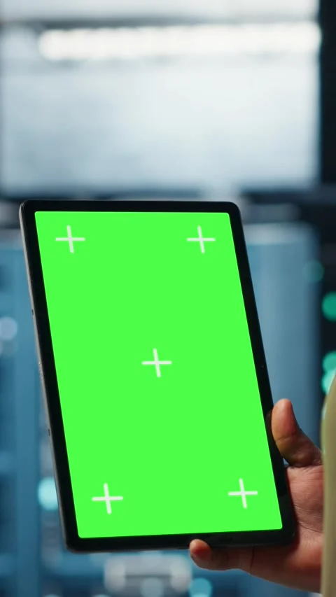 Vertical video Admin with isolated screen tablet in data center doing power Stock Footage 317054898
