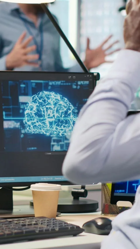 Vertical video Admin in office relies on AI machine learning to run tasks across Stock Footage 312708150