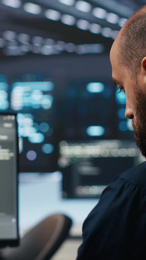 Vertical video Admin running coding script on computer screen in high tech data Video stock 274679814