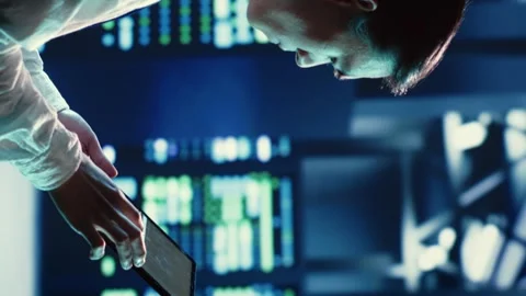 Vertical video Admin runs code in data center Stock Footage 249844337