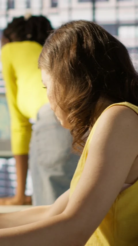 Vertical video Admin tests on computer and tablet to optimize artificial Stock Footage 319484481