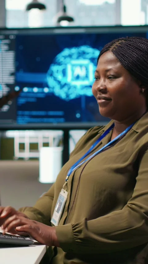 Vertical video Admin using AI neural networks tech on computer to optimize Stock Footage 312769049