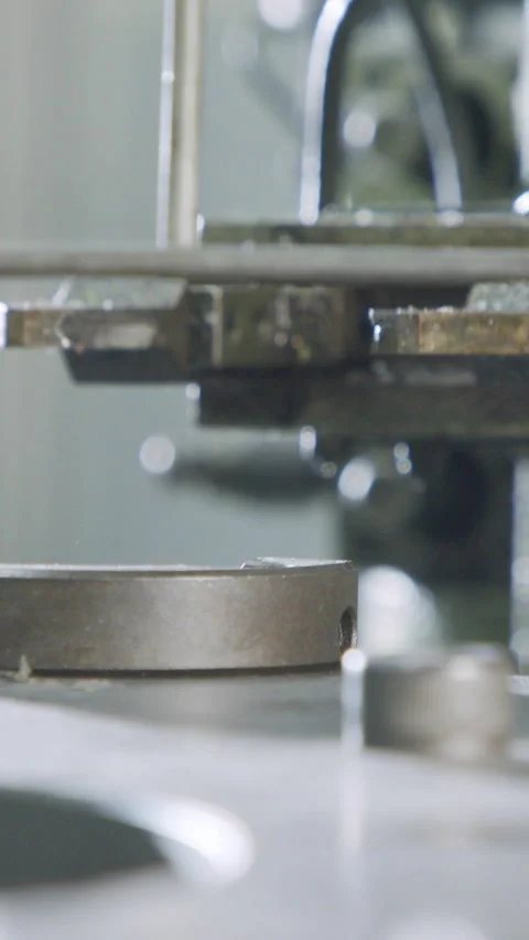 Vertical video of Advanced robotic machine manufacturing parts in an automated Video stock 206324119