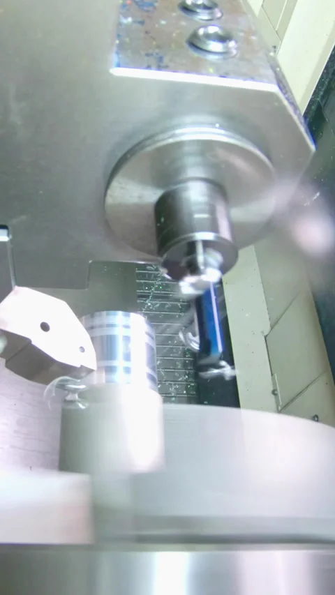 Vertical video of Advanced robotic machine manufacturing parts in an automated Stock Footage 206332618