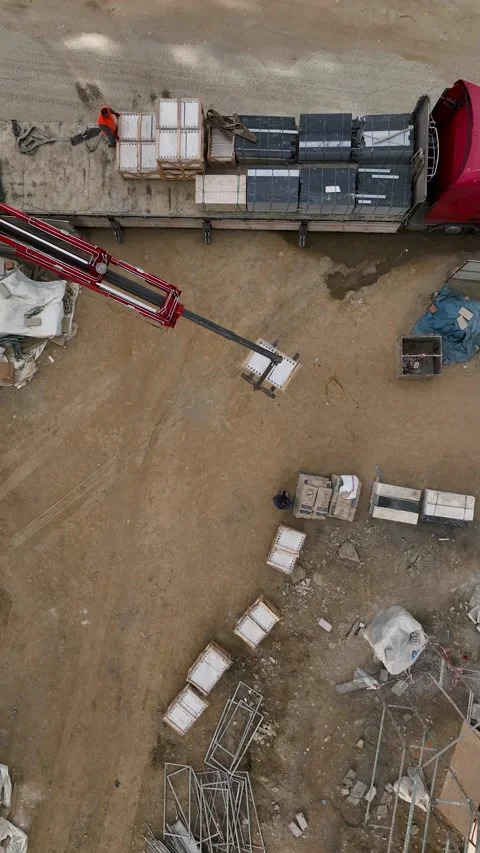Vertical Video: Aerial Construction Time - Crane Operations and Builders in Full Stock Footage 245191696