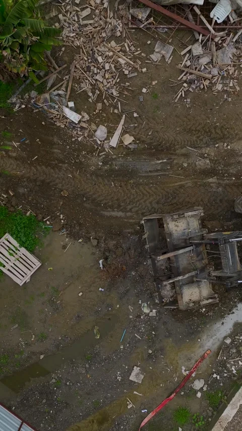Vertical Video Aerial Excavator Working on Construction Site Near Fresh Concrete Stock Footage 342138707