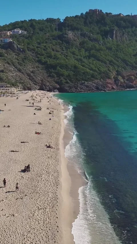 Vertical Video: Aerial View of a Large Beach on the Mediterranean With Vibrant Stock Footage 300331125