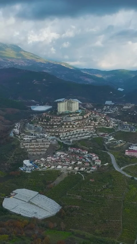 Vertical Video: Aerial View of a Small Coastal City by the Mediterranean Sea Video stock 342593841