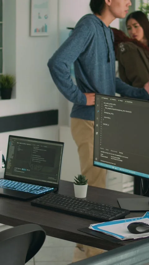 Vertical video: African american coder using computer to write code and develop Stock Footage 218577860