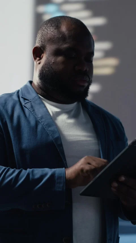 Vertical Video African american coder expert immersing in software development Stock Footage 312176574