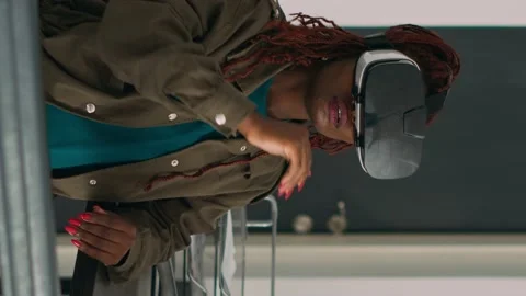 Vertical video: African american developer working with vr glasses Stock Footage 219702193