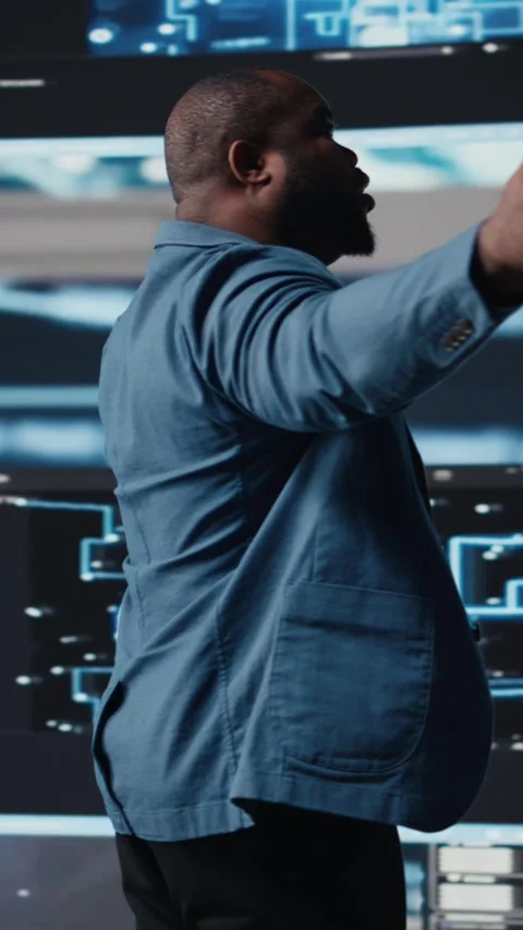 Vertical Video African American developer working in a cyber environment Stock Footage 312123365