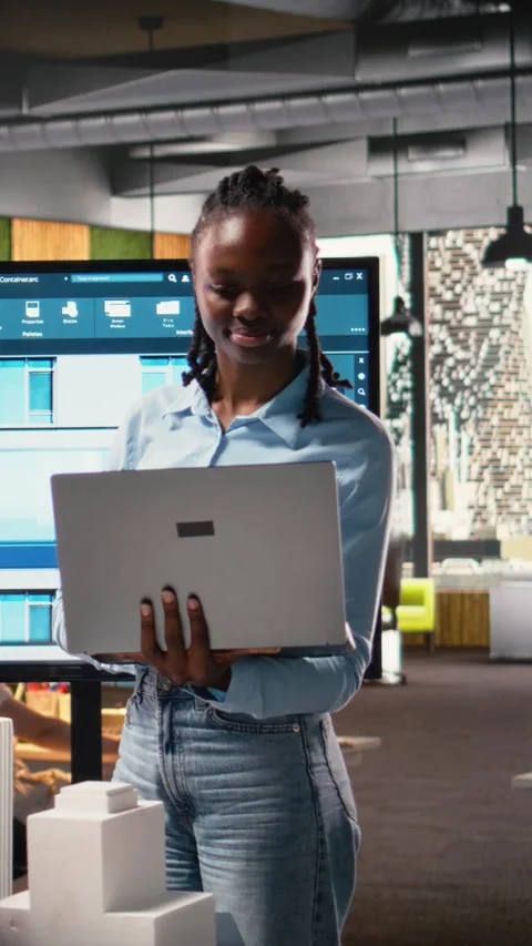 Vertical Video African american developer using modern design software to create Stock Footage 316183433