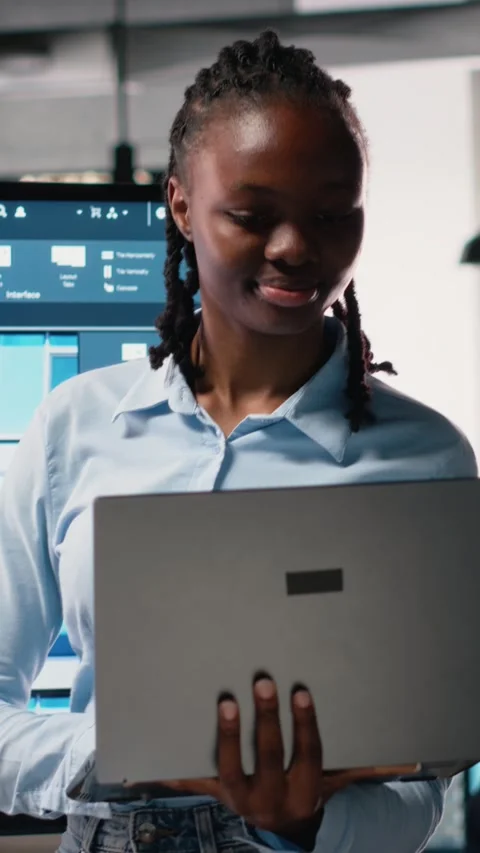 Vertical Video African american developer using modern design software to create Stock Footage 316184147