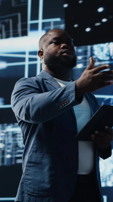 Vertical Video African american engineer examining artificial intelligence brain Stock Footage 312124100