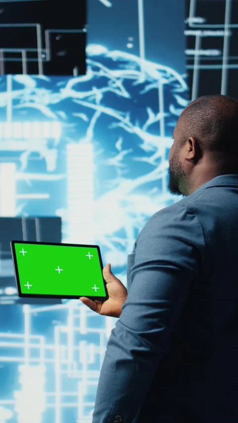 Vertical Video African american engineer shows tablet with isolated mockup Stock Footage 312176362
