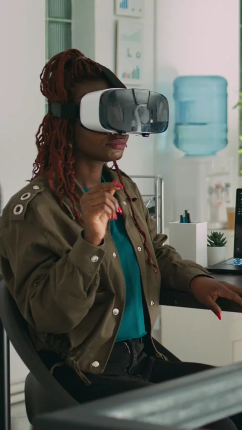 Vertical video: African american programmer working with vr glasses Stock Footage 218575870