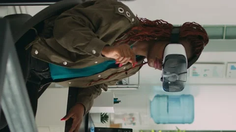 Vertical video: African american programmer working with vr glasses Stock Footage 220160517