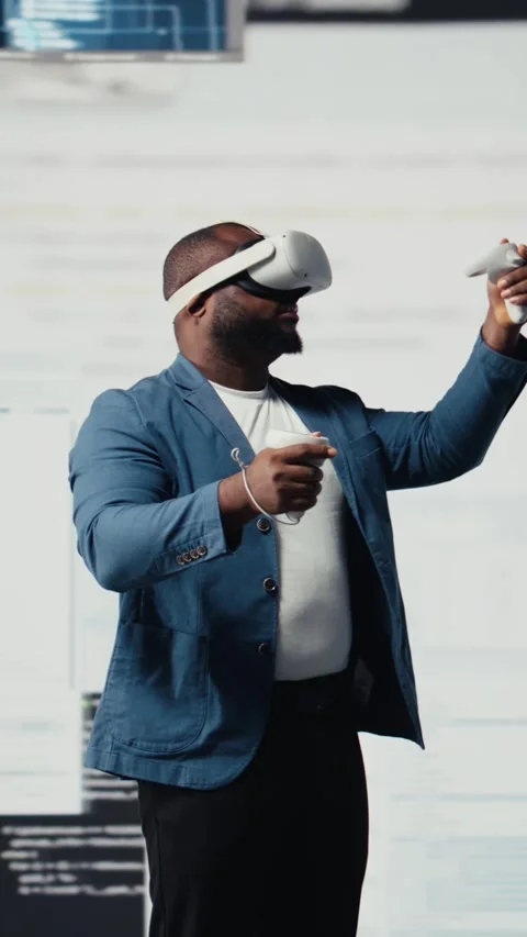Vertical Video African American programmer engaging in virtual reality with a Stock Footage 312123675