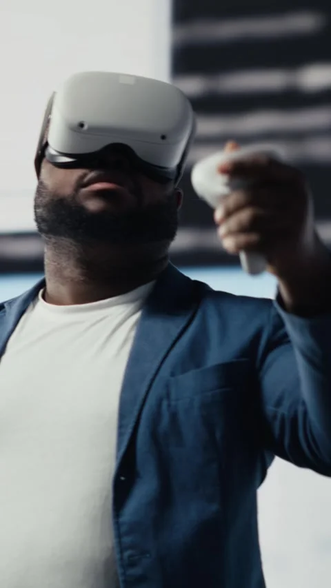 Vertical Video African american software developer uses virtual reality headset Stock Footage 312123353
