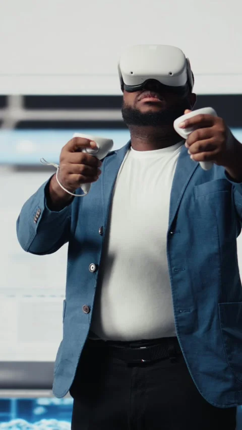 Vertical Video African american software developer uses virtual reality headset Stock Footage 312176930
