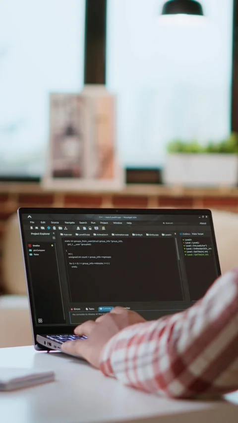 Vertical Video African american software engineer works on laptop typing code Stock Footage 319473518