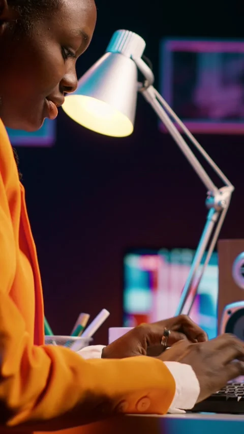 Vertical Video African american system engineer using AI system to write Stock Footage 264809282