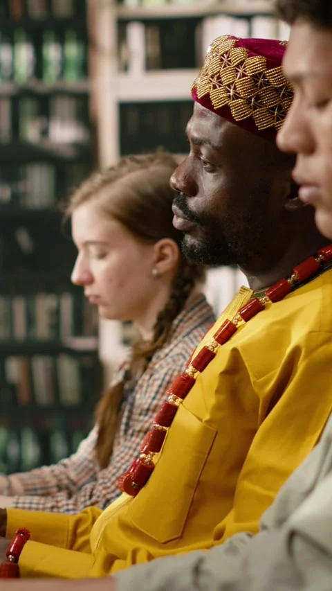 Vertical Video African man student working at desktop computer and wearing Stock Footage 337530526