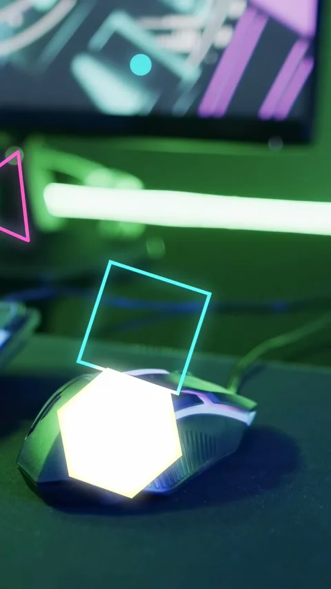 Vertical video: After pause neon shapes appearing rotating over wired gaming 库存影片 335507513