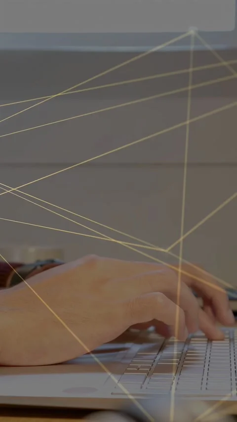 Vertical video: After resting hands, man typing on laptop keys, overlay Stock Footage 333912881