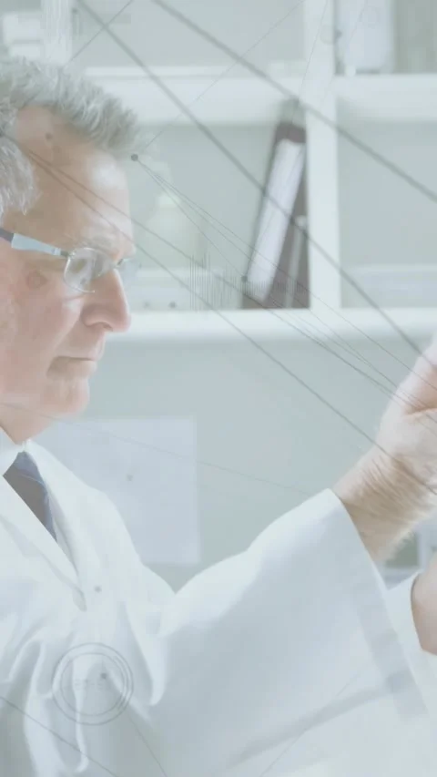 Vertical video: After spotting box, lab tech lifting tube, rotating and tuning Stock Footage 330655417