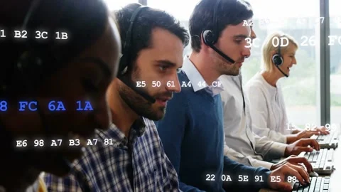 Vertical video: Agents on headsets handling calls, camera panning, data codes Stock Footage 333509878