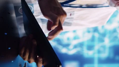 Vertical video AI engineer running code in data center Stock Footage 250361765