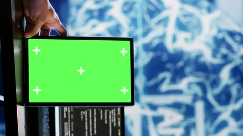 Vertical video AI script coding on green screen tablet Stock Footage 249843541