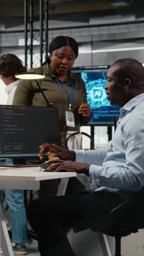 Vertical video AI startup office personnel automating workflows using neural Stock Footage 323331328