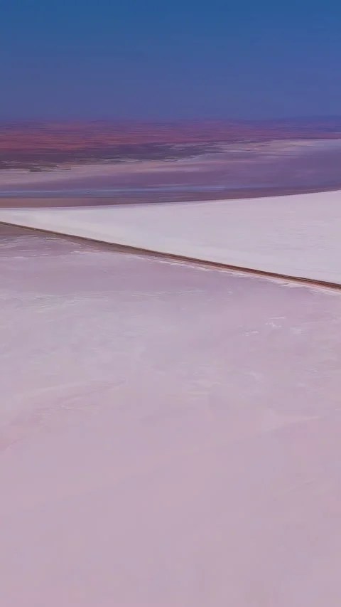 Vertical video. Aksaray, Turkey. Tuz Golu salt works, geometric pink evaporation Stock Footage 339764827