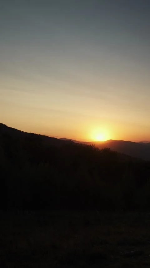 Vertical video of amazing sunset in beautiful mountains Stock Footage 286313982