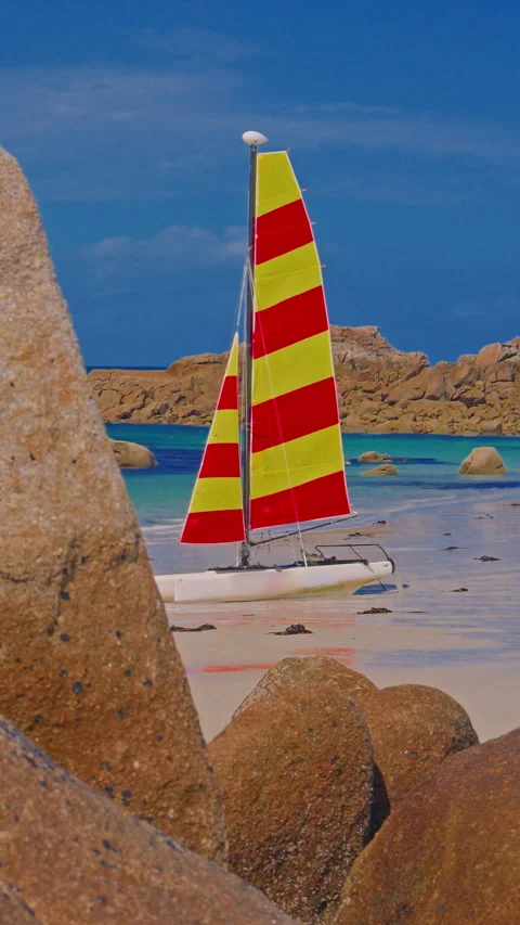 Vertical video. Amiets azure beach in summer with rocks in the region of Stock Footage 303661767