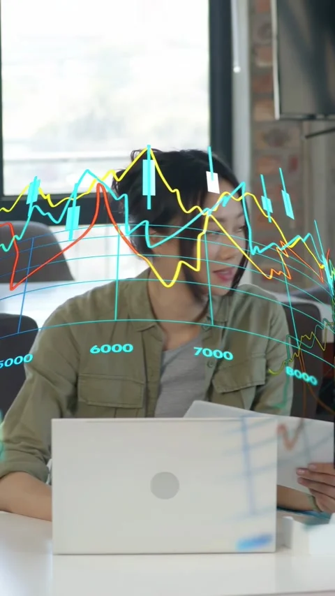 Vertical video: Analyst picking docs, reviewing finance data while hologram Stockbeeldmateriaal 337540533