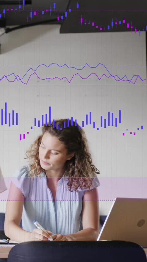 Vertical video: Analyst receiving paper, annotating notes while comparing to Stock Footage 333036838