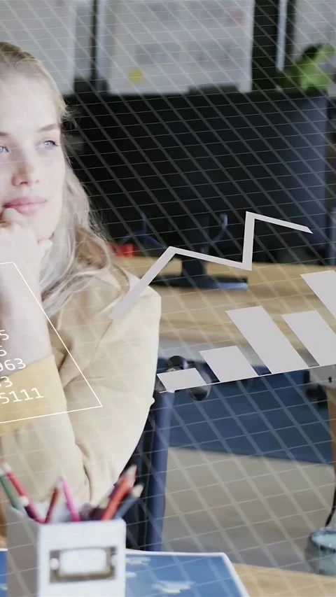 Vertical video: Analyst resting chin watching data panels layering desk Stockbeeldmateriaal 335513283