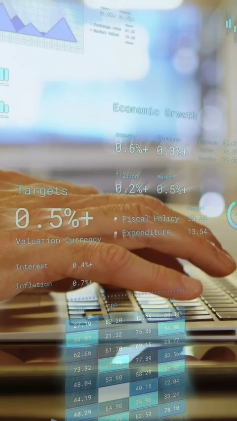Vertical video: Analyst typing after rest, causing finance HUD updating charts, Stock Footage 334792686