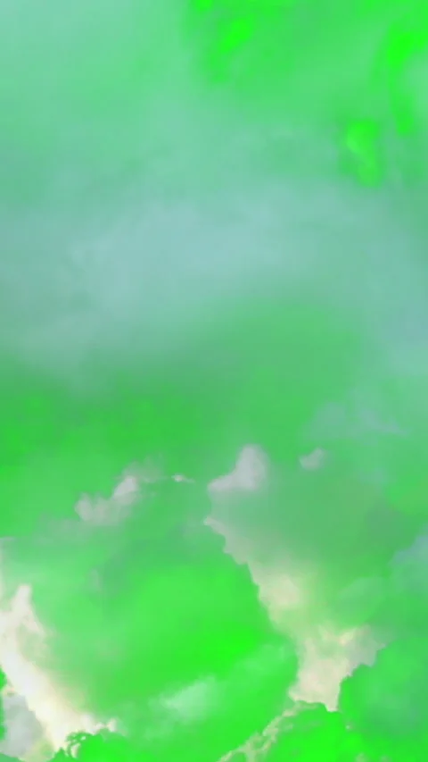 Vertical video animation - Flying Through The Clouds On The Green Screen Back Stock Footage 224034029