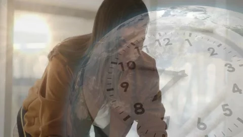 Vertical video: Answering call brown-jacket woman moving phone to laptop typing Stock Footage 331165812