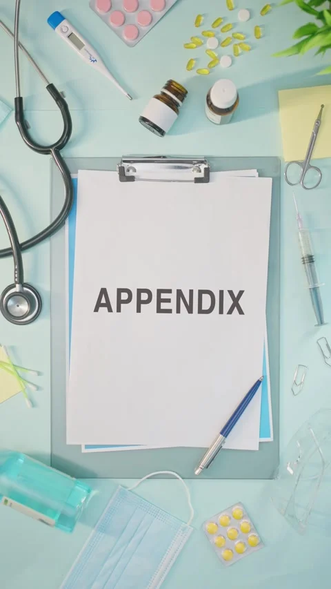 VERTICAL VIDEO OF APPENDIX WRITTEN ON MEDICAL PAPER Stock Footage 308106053