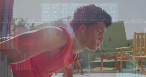 Vertical video: Approaching mat man in red top doing pushups on sunny patio Stock Footage 334039587