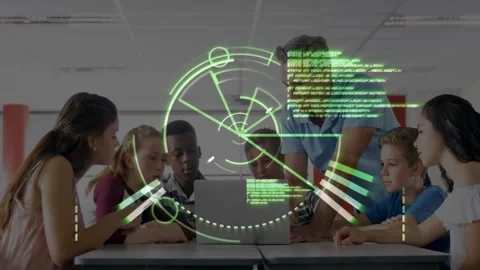 Vertical video: Approaching tutor in blue polo pointing at laptop at school 動画素材 331214061