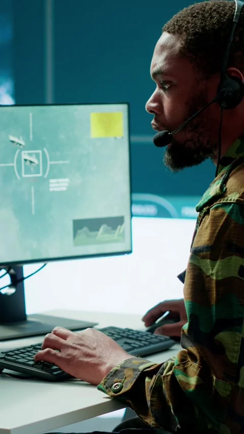 Vertical Video Army intelligence specialist utilize advanced computer systems Stock Footage 280012060